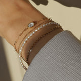 Bezel Oval Bracelet | 14K Gold & White Topaz