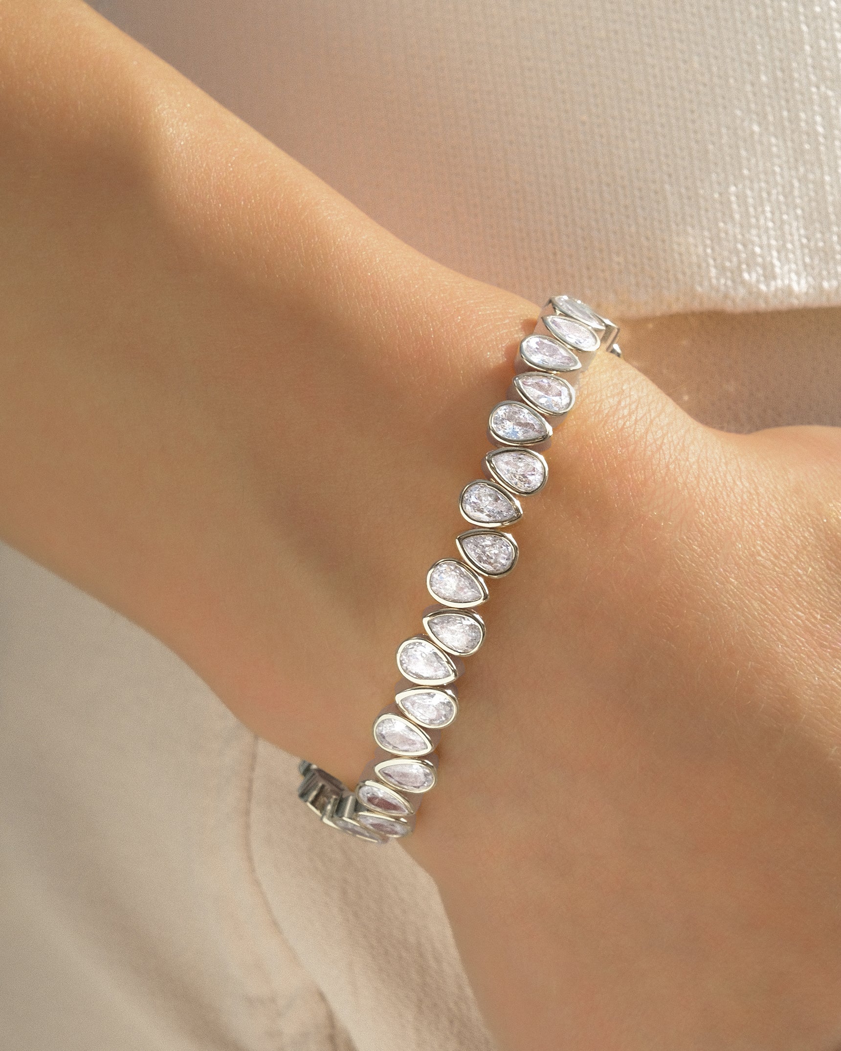 Teardrop Bezel Silver Stretch Tennis Bracelet