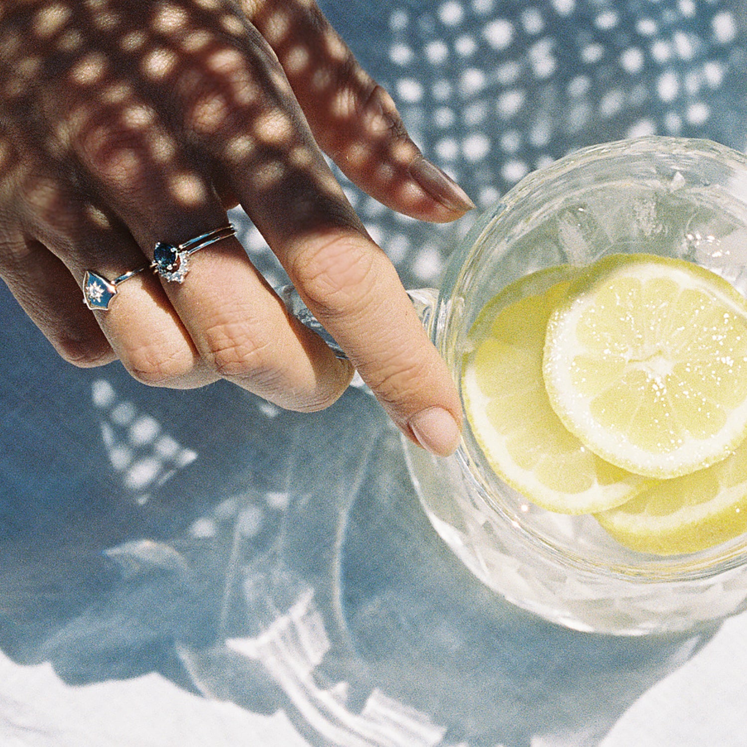 crystal glass jug silver ring stack